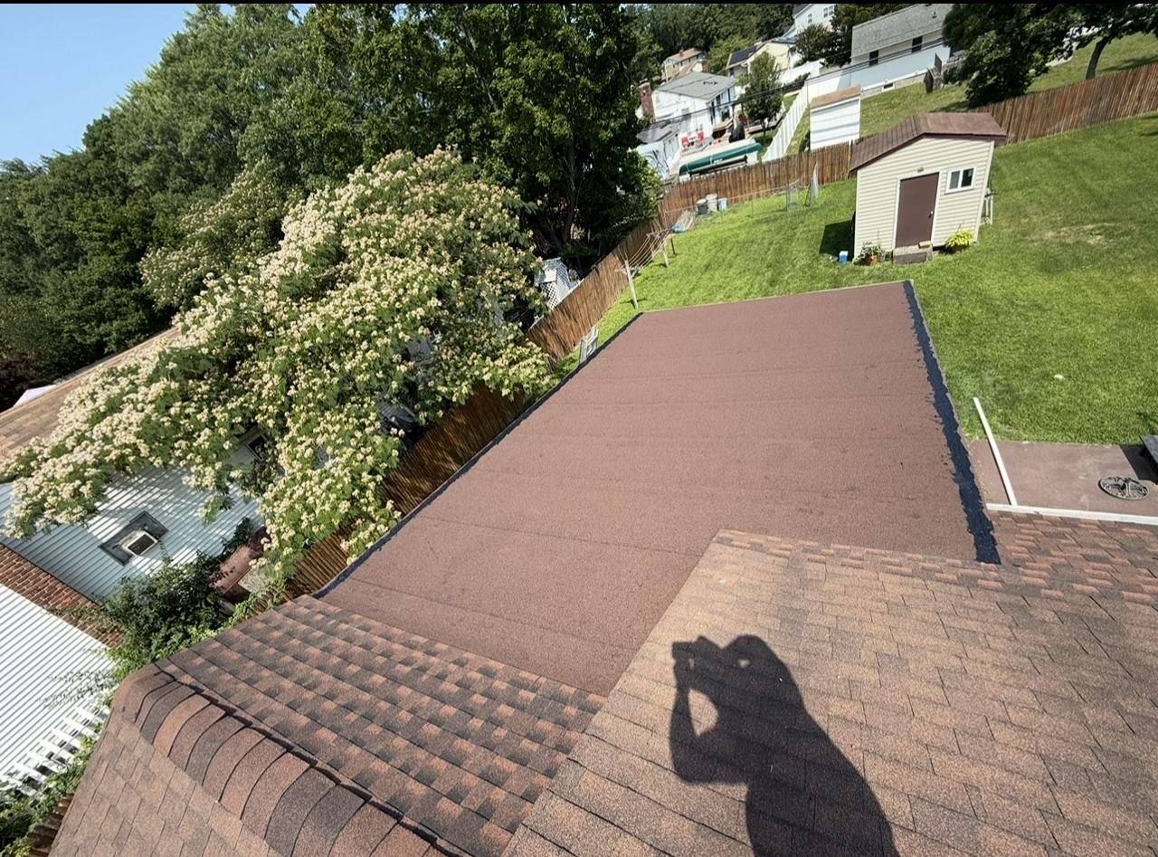 Flat roof re-deck and new roofing - after